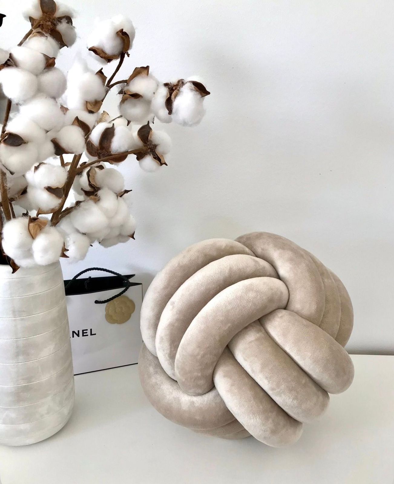 knot Pillow  The perfect blend of comfort and style. Add a touch of modern luxury to your living space.