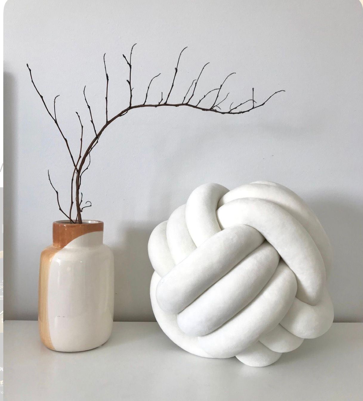 Knot Pillow   The perfect blend of comfort and style. Add a touch of modern luxury to your living space.
